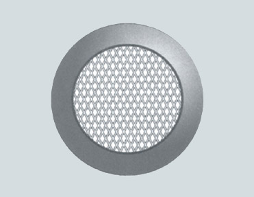 A round metal plate with a pattern on it made of stainless steel.