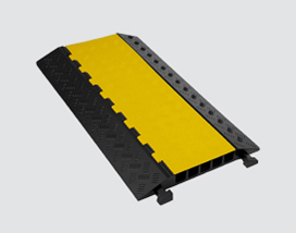 A yellow PVC barrier with a black strip.