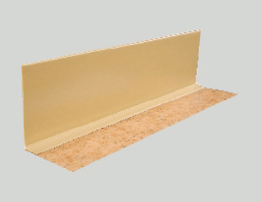 An image of a beige wall with a beige border featuring PVC skirting.