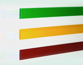 A row of colored strips on a white wall with Foam Corner and Wall Guard.