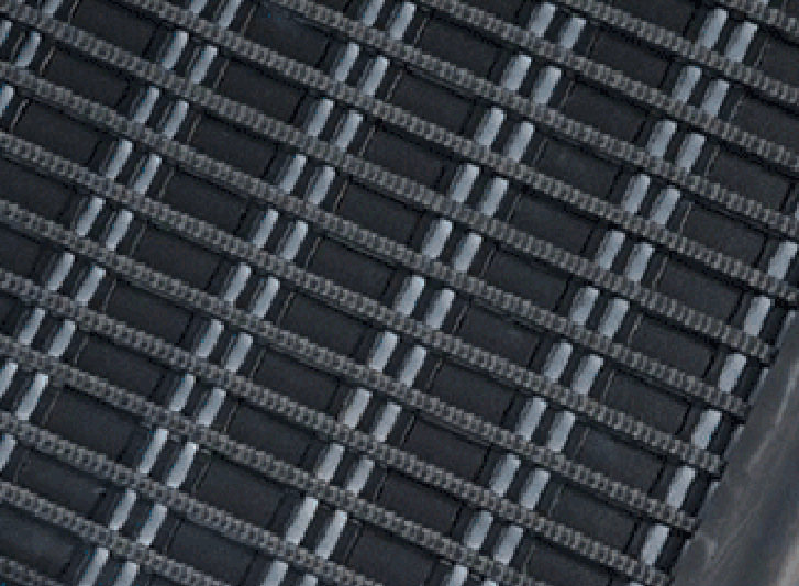 A close up image of a black PVC entrance mat.